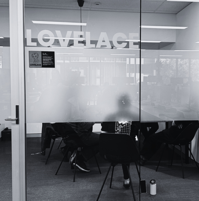 A female software developer workign in the WorkingMouse office.