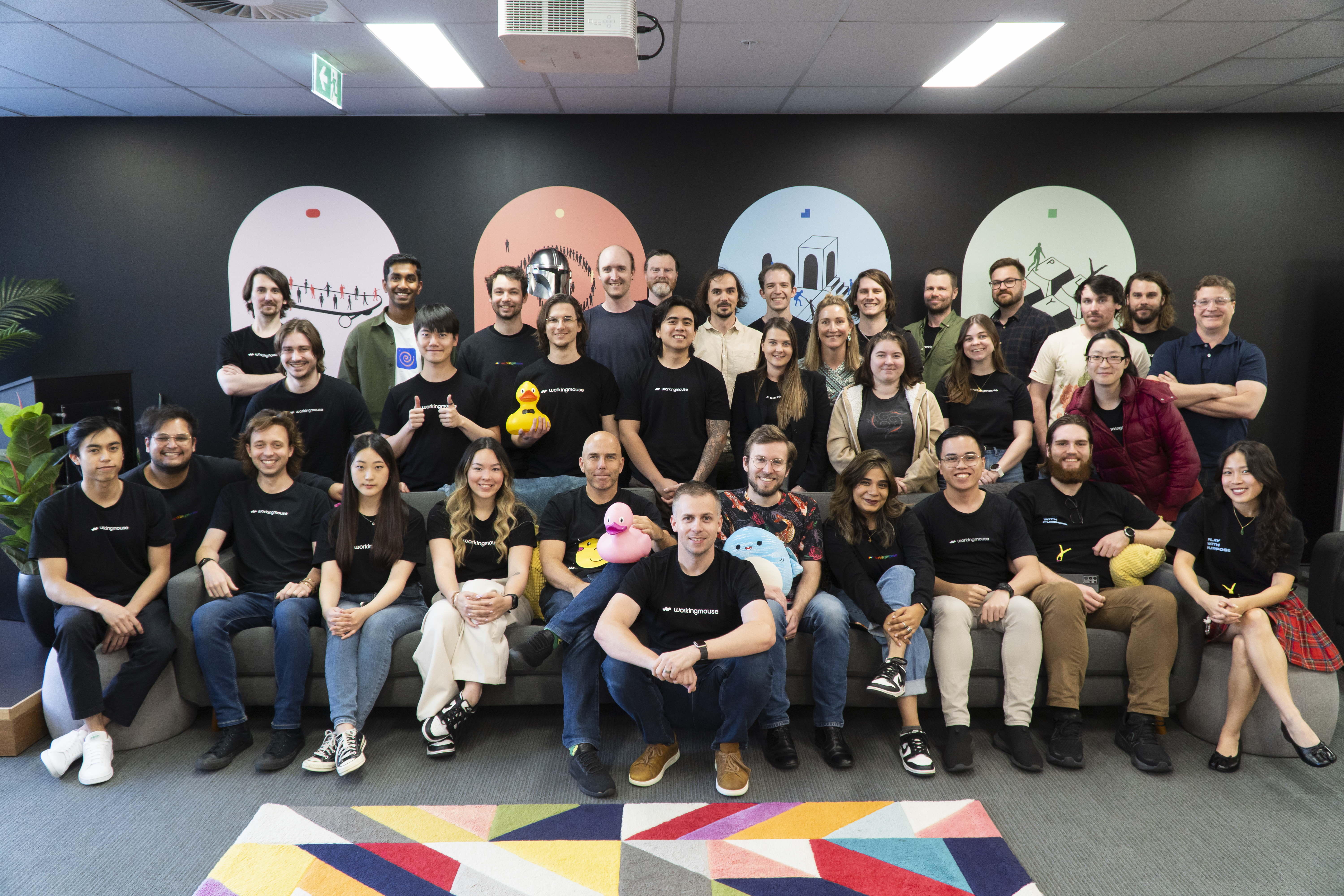 A group photo of the WorkingMouse team