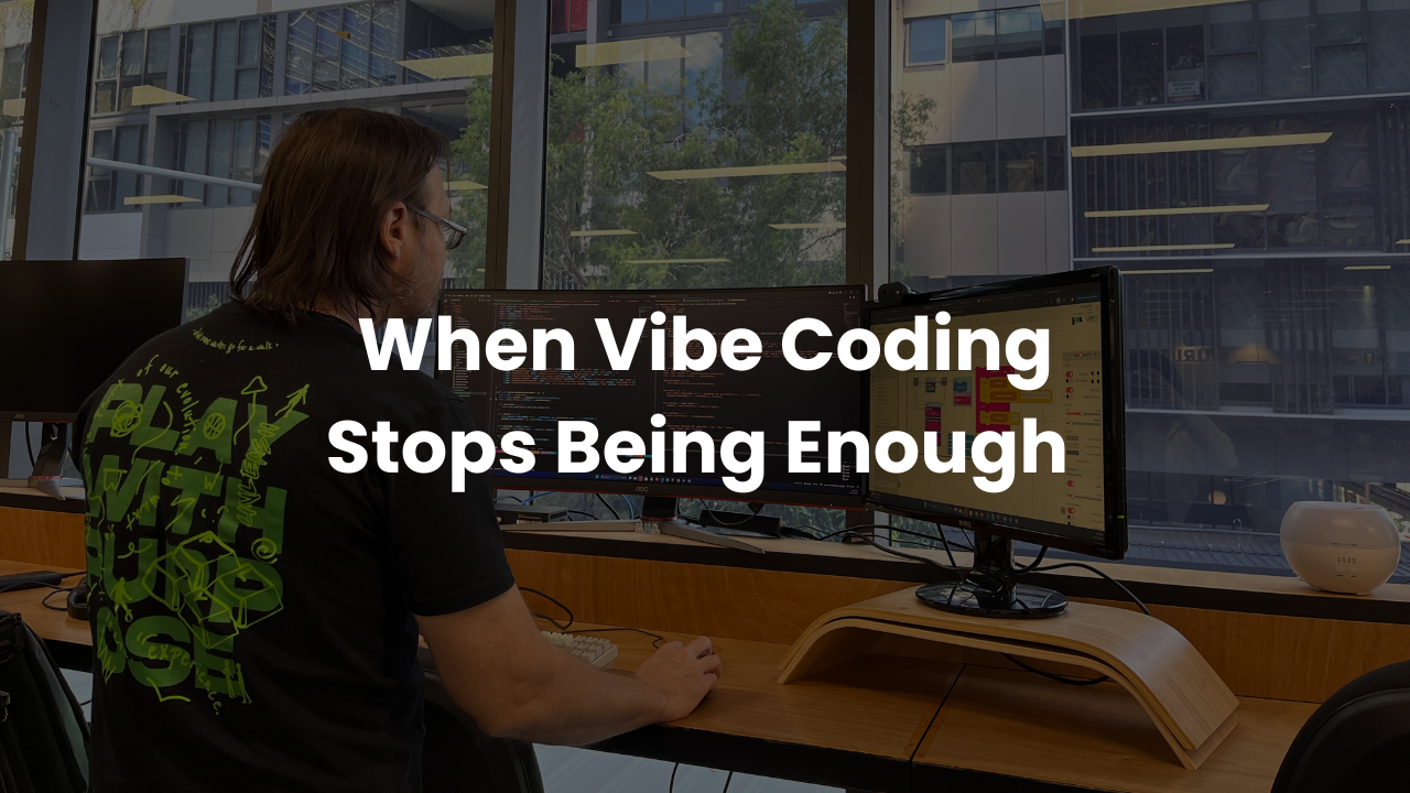 Man looking at computer screens