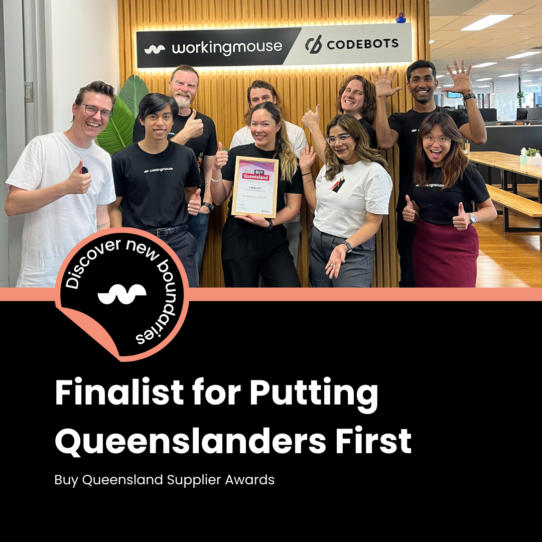 Wokingmouse employees posing with the award in WorkingMouse HQ