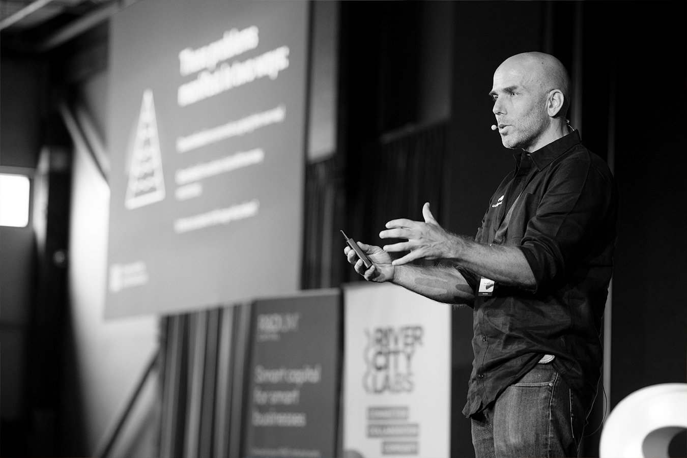 A photo of Dr. Eban Escott speaking